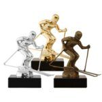 Alpinstatuett i metall